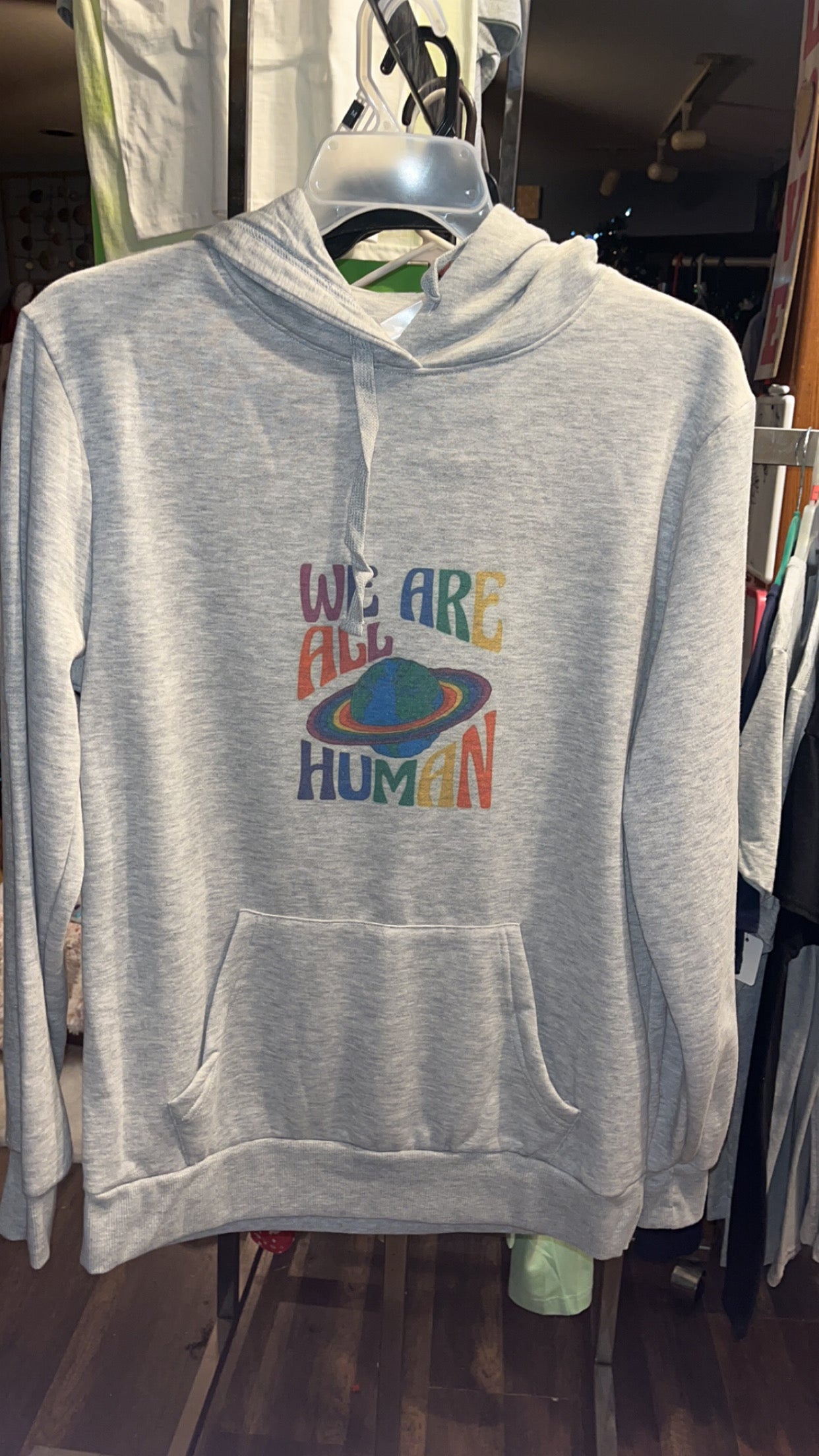 “We are all human” adult hoodie
