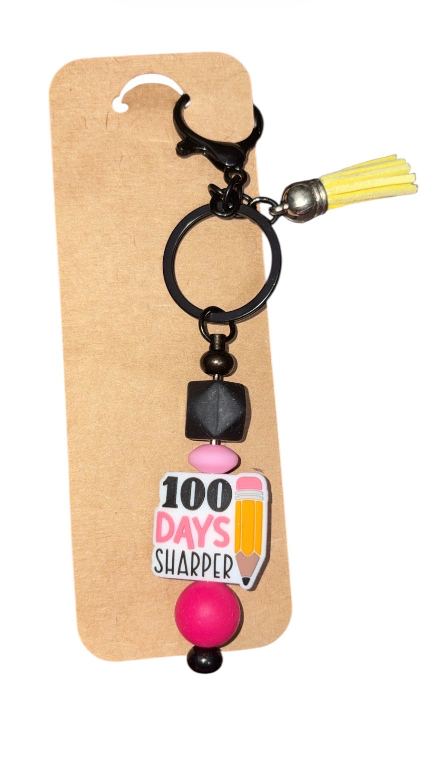 “100 days sharper “ keychain