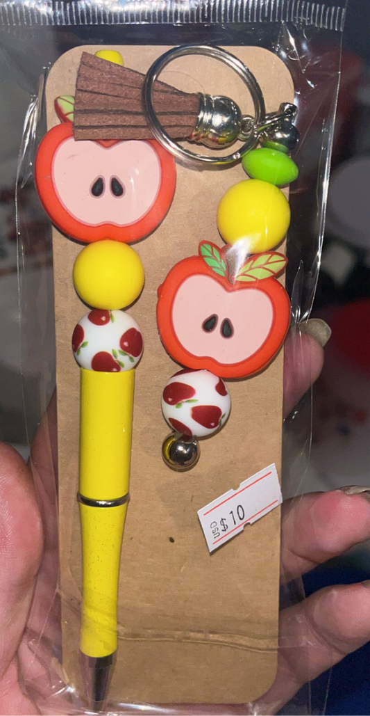 Apple style keychain and pen bundle